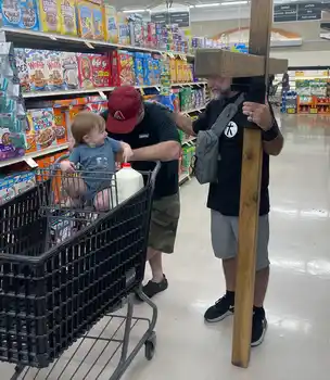 Mike praying on cross walk