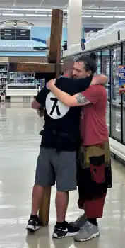 Mike praying on criss walk